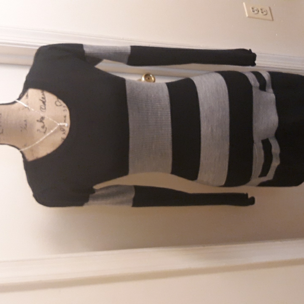 A long sleeved sweater dress